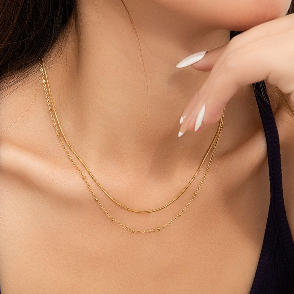 Collier multirang doré chaîne serpent et satellite