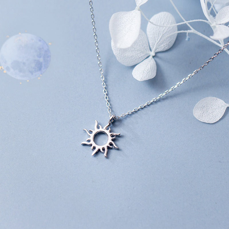 Collier pendentif soleil argent