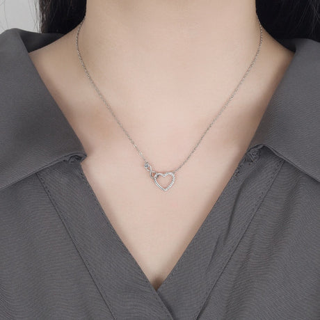 Pendentif cœur argenté femme signe infini