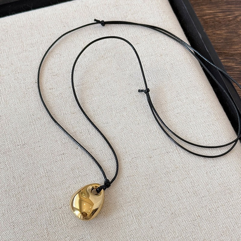 Collier tendance avec cordon ajustable doré
