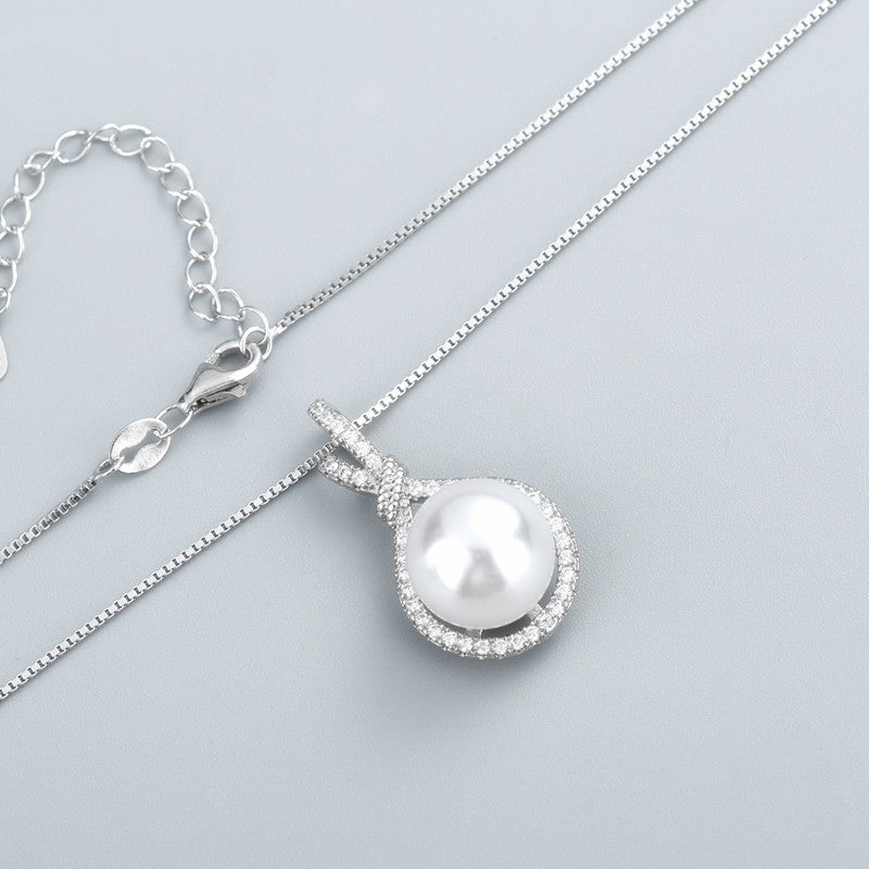 Collier avec pendentif perle