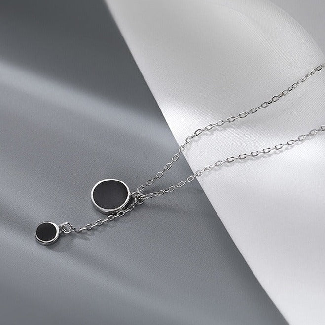 Collier rond argent et noir