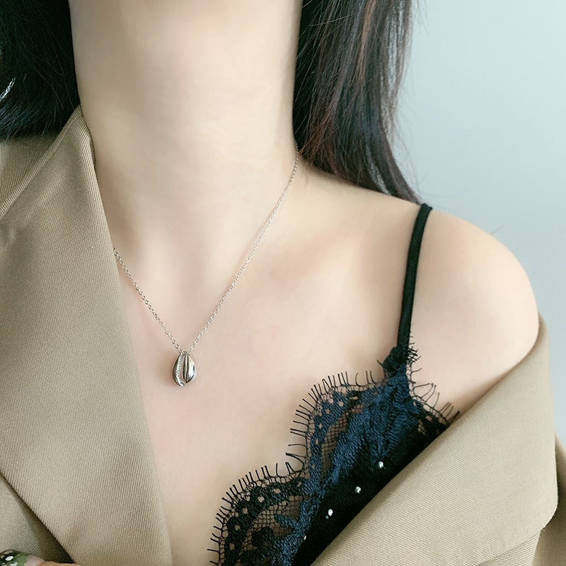 Collier coquillage long