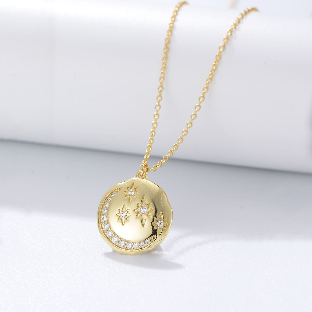 Collier pendentif lune et étoiles doré
