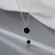 Collier rond argent et noir