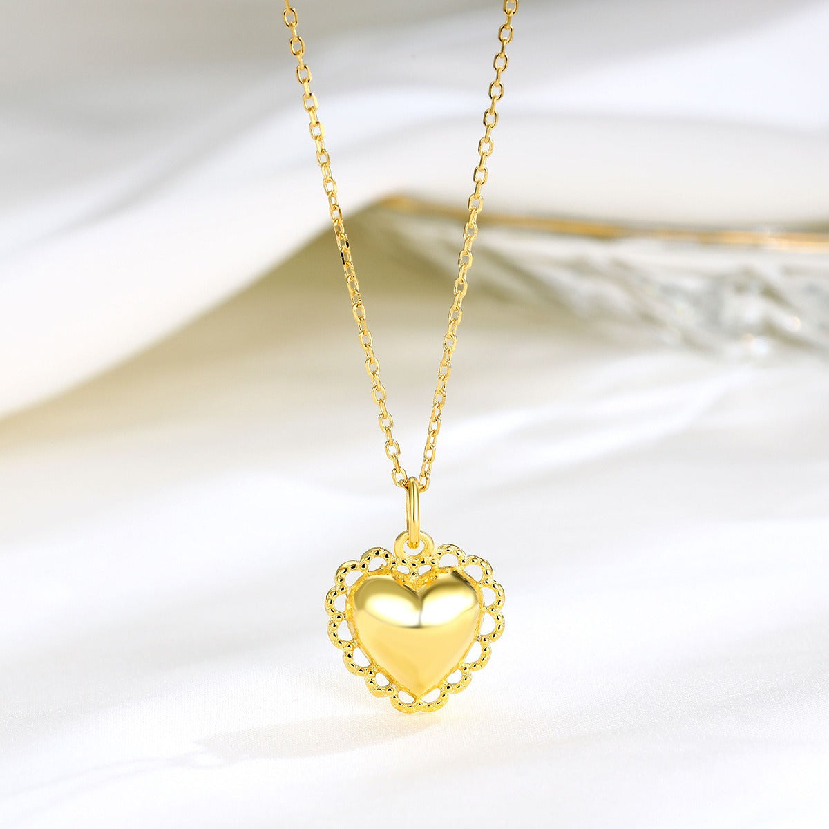 Pendentif cœur sacré