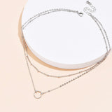 Collier ras de cou pendentif rond double rang