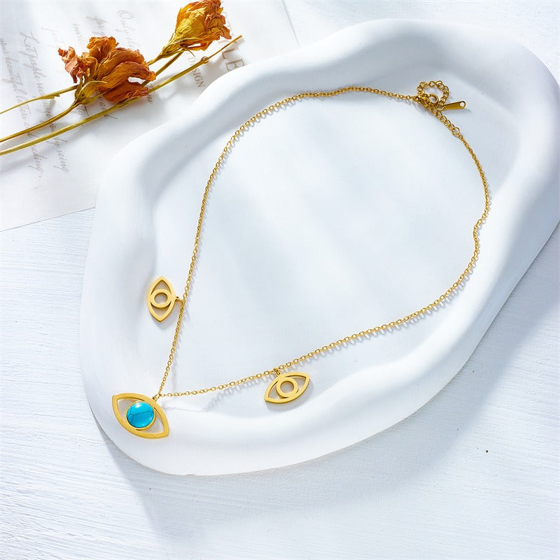 Collier œil doré avec pierre turquoise