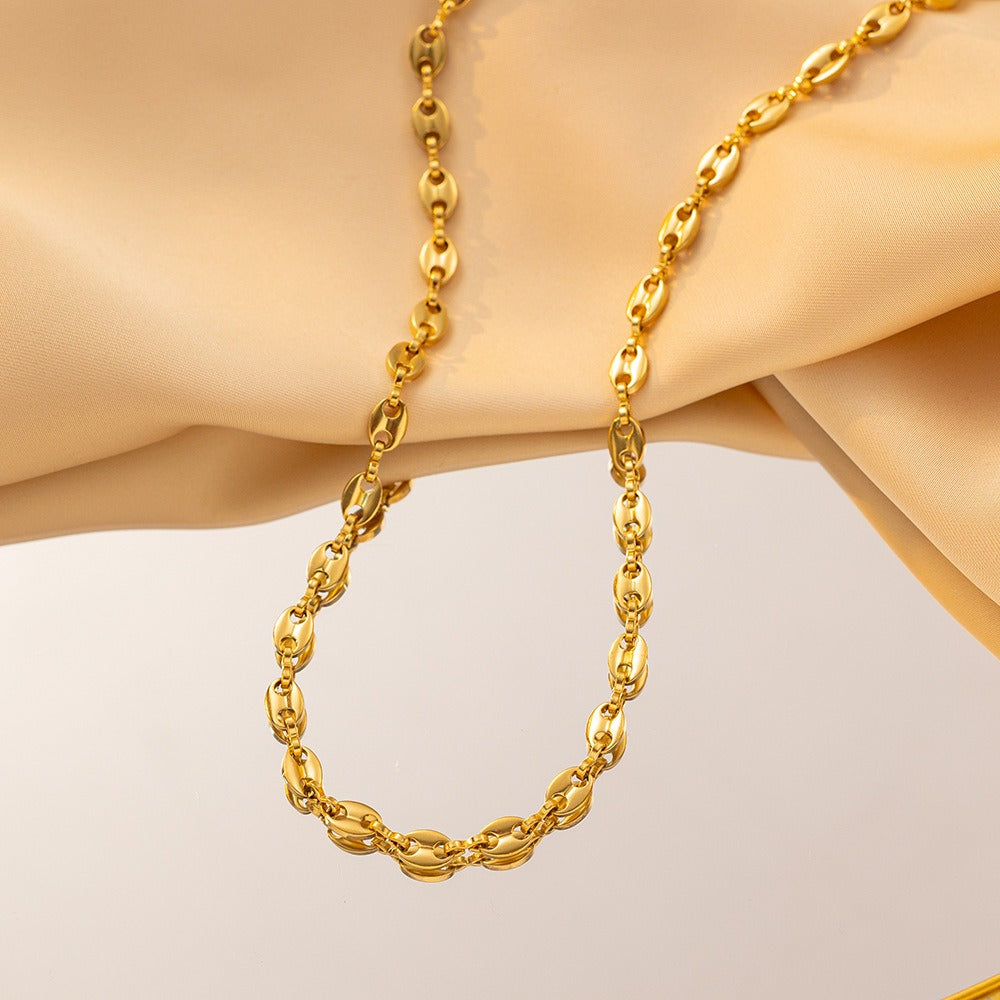 Collier grain de café doré