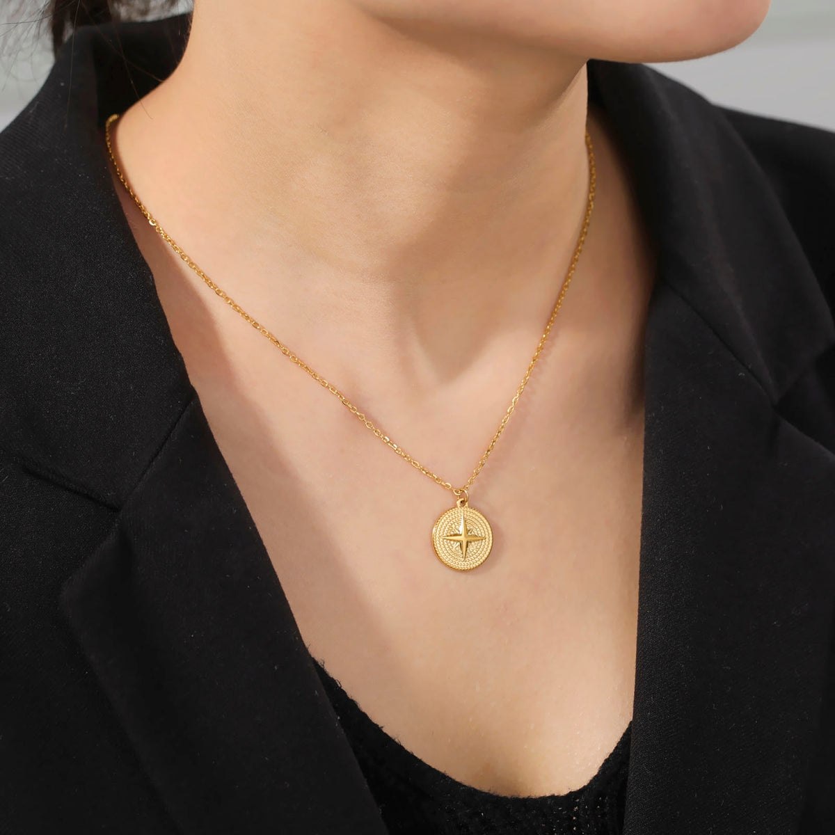 Collier boussole argenté