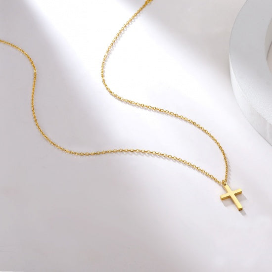 Collier pendentif croix dorée