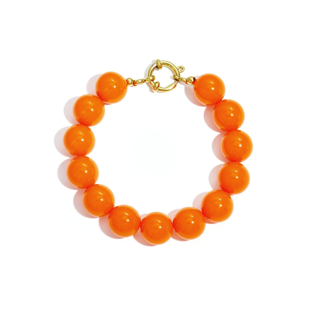 Bracelet à grosses perles et fermoir sur le devant