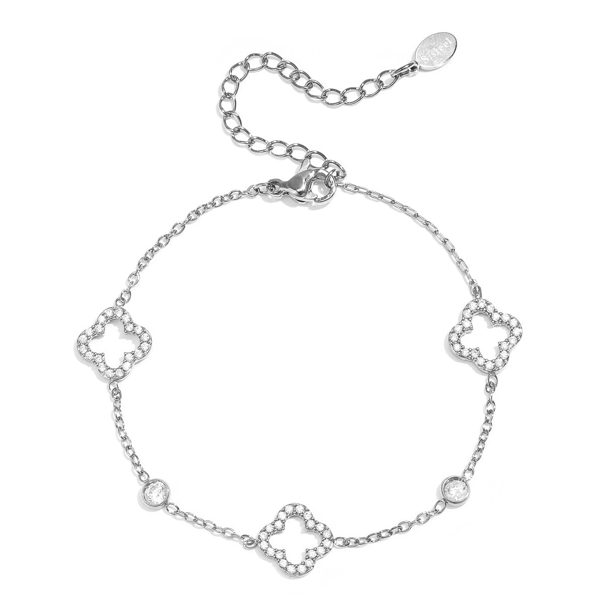Bracelet ajouré orné de trèfles et de pierres incrustées.