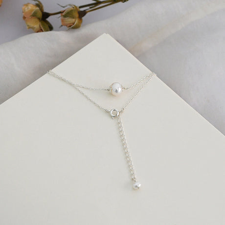 Collier perle blanche ras de cou