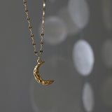 Collier demi lune doré