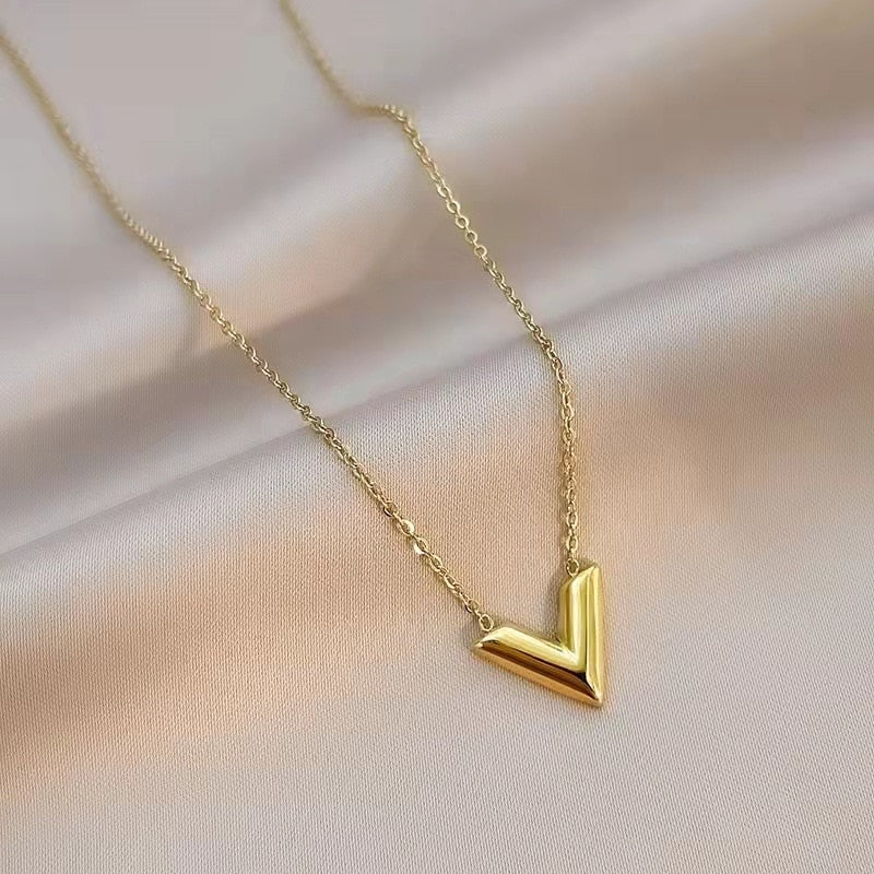 Pendentif triangle en V