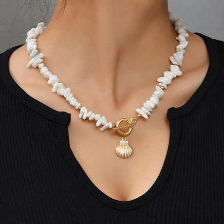 Collier coquillage blanc et or