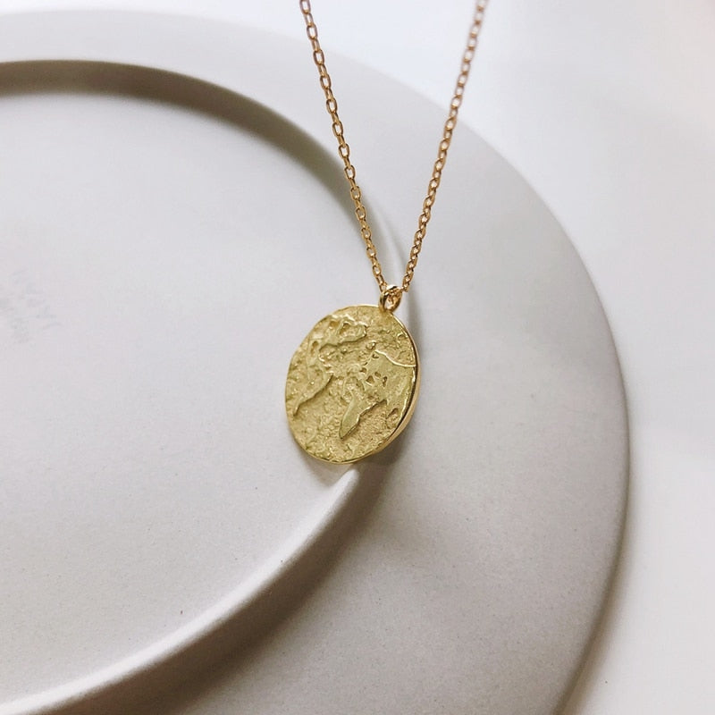 Collier carte du monde vintage