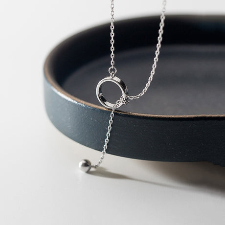 Collier Cercle et Boule Minimaliste