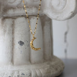 Collier demi lune doré