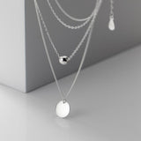 Collier avec pendentif rond