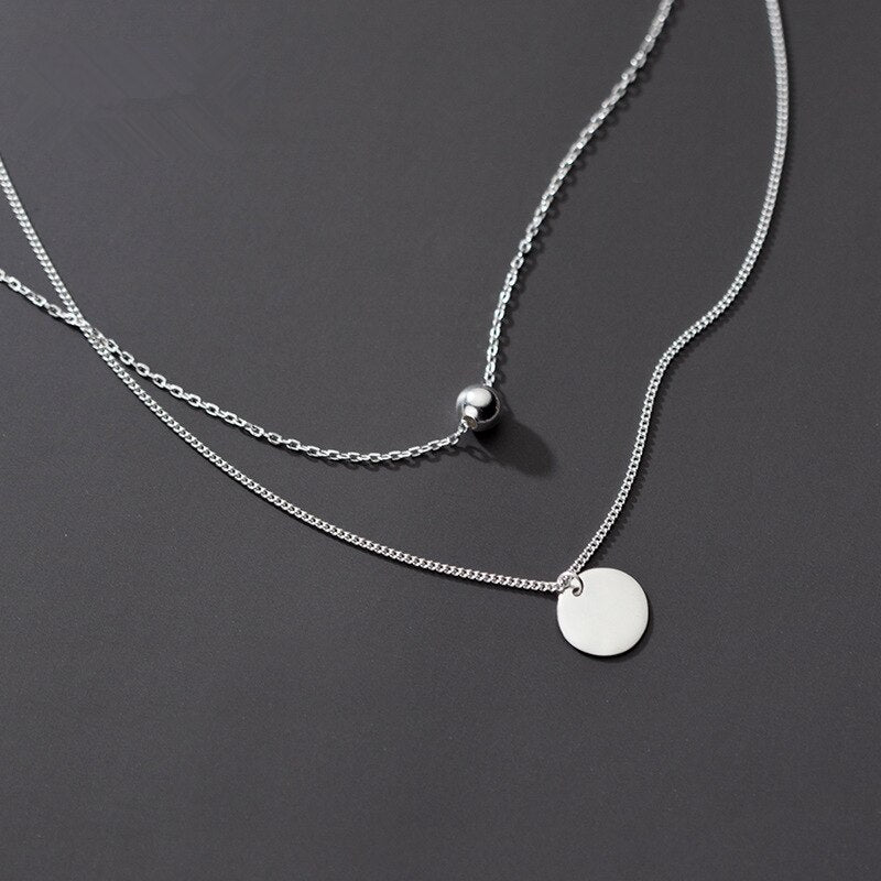 Collier avec pendentif rond