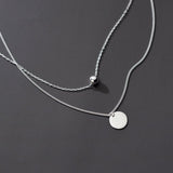 Collier avec pendentif rond