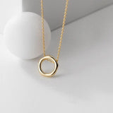 Collier en or pendentif rond