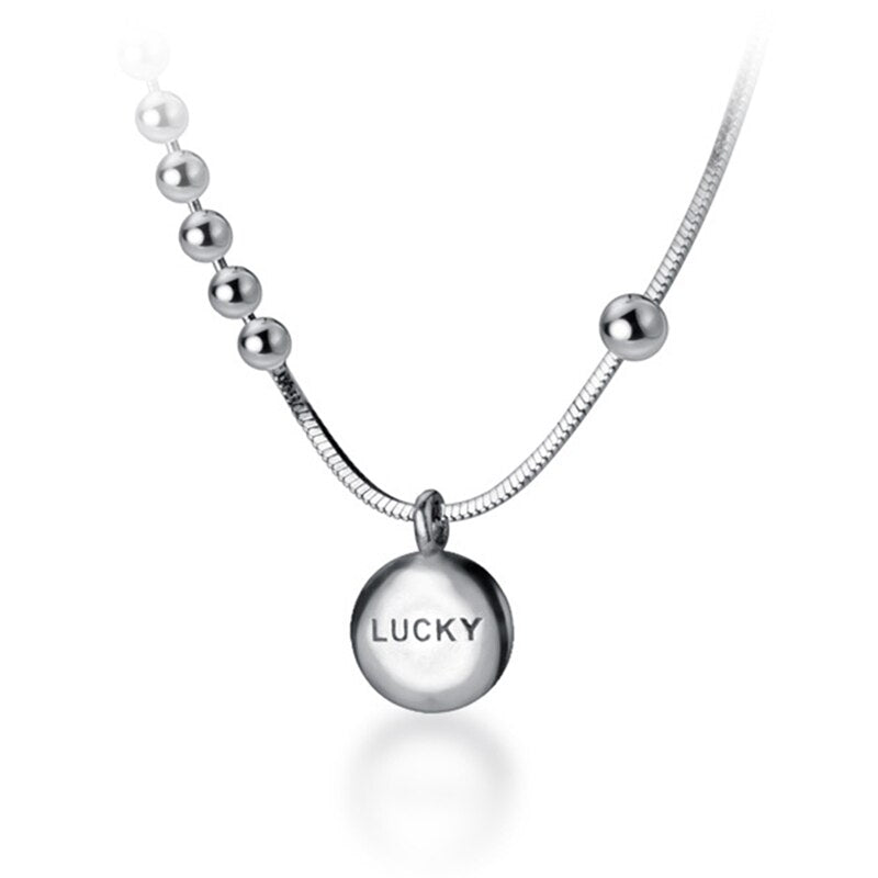 Pendentif rond lucky