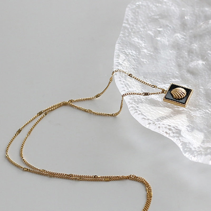 Collier coquillage noir