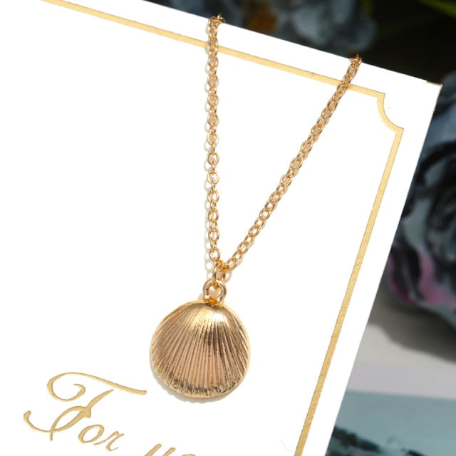 Collier coquillage en or